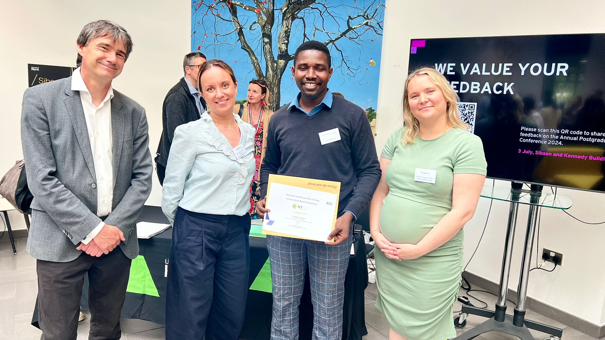 2024 PGR Conference: Receiving the 3MT Award, Building Connections and Spinning the Success Wheels